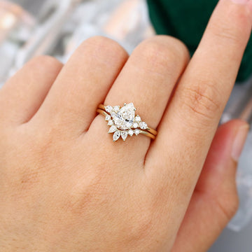 1.5 Carat Pear Shaped Moissanite Engagement Ring Set In Yellow Gold