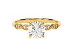 Load image into Gallery viewer, A round cut moissanite engagement ring with milgrain accented double round sidestones, set in a white gold band.