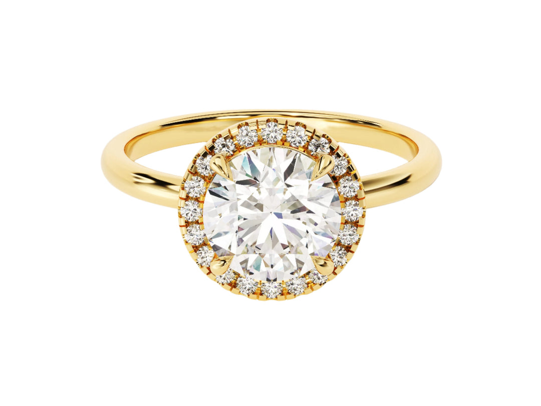 A round halo moissanite engagement ring with a 1.50 ct center stone, encircled by a halo of smaller moissanite stones, set in a gold band.