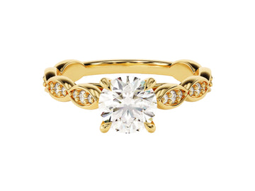 A vintage sidestones round cut moissanite engagement ring with a 1.00 ct center stone and smaller round cut side stones set in a gold band.