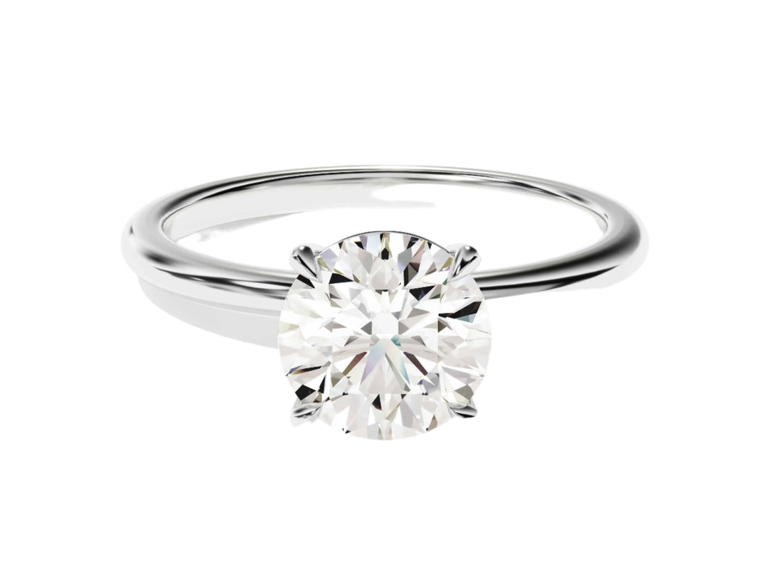 4-prong Solitaire Round Cut Moissanite Engagement Ring (1.50 Ct)