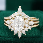 Load image into Gallery viewer, Yellow Gold Oval Cut Moissanite And Diamond Cluster Engagement Ring Set

