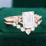 Load image into Gallery viewer, Emerald Cut Moissanite Criss Cross Diamond Accented Bridal Ring Set
