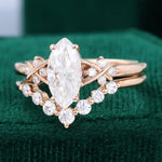 Load image into Gallery viewer, 1CT Marquise Cut Moissanite Criss Cross Diamond Accented Bridal Ring Set
