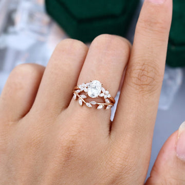 Oval Cut Moissanite Leaf Engagement Ring Set In Rose Gold