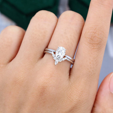 Oval Cut Solitaire Moissanite Engagement Ring Set In White Gold