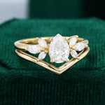 Load image into Gallery viewer, Pear Shaped Moissanite Cluster Engagement Ring With Plain Curved Wedding Band Bridal Set
