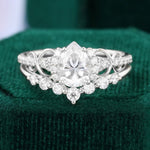 Load image into Gallery viewer, Pear Shaped Moissanite Bridal Ring Set Infinity Wedding Set
