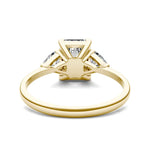Load image into Gallery viewer, Emerald Claw Prong Trillion Three-stone Engagement Ring
