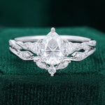 Load image into Gallery viewer, Pear Shaped Moissanite Twisted Engagement Ring Set In White Gold
