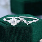 Load image into Gallery viewer, Pear Shaped Moissanite Twisted Engagement Ring Set In White Gold
