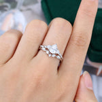 Load image into Gallery viewer, Pear Shaped Moissanite Twisted Engagement Ring Set In White Gold
