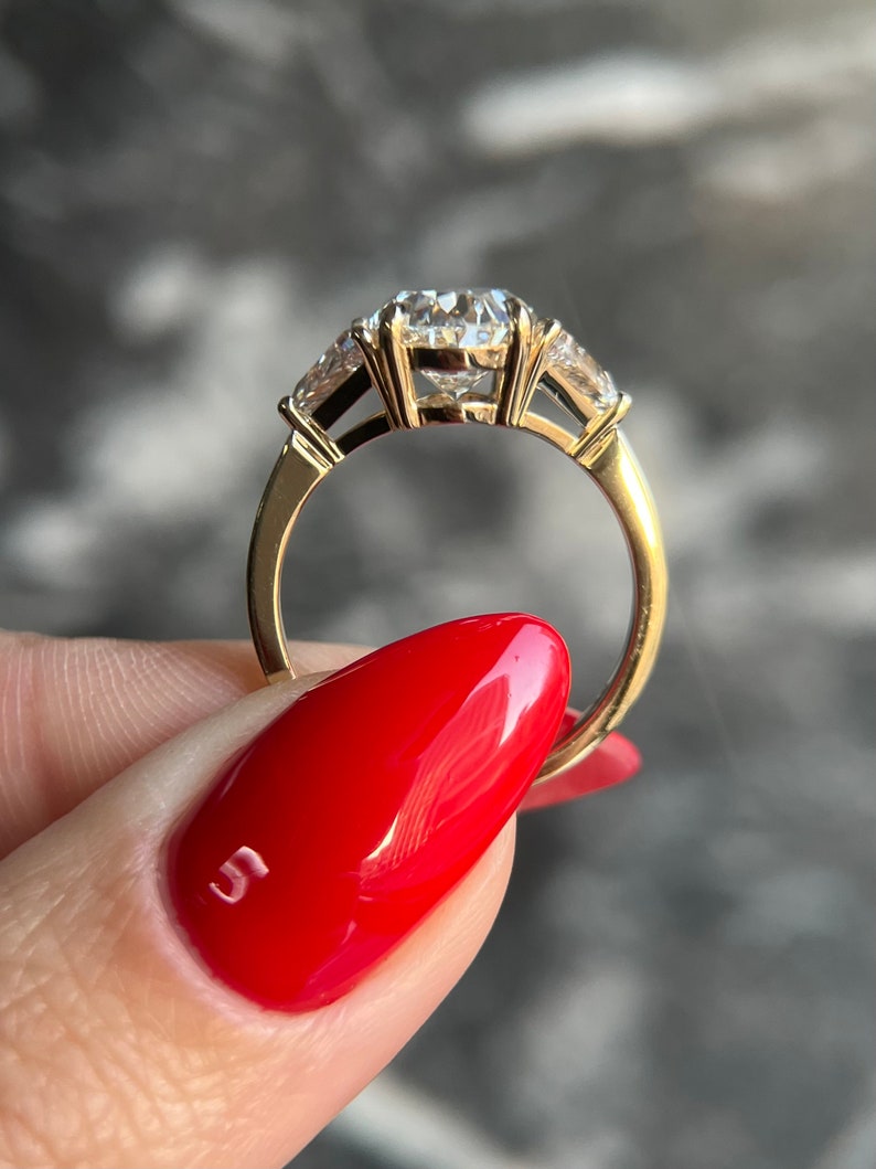 Oval 3.5 carat IGI Certified D Color VVS2 Clarity Lab Grown Diamond Three Stone Engagement Ring, Side Trillion Cut Diamonds 14k Yellow Gold image 4
