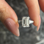 Load image into Gallery viewer, Emerald Cut 4.50 carat Rare D Color VVS2 Clarity IGI Certified Lab Grown Diamond Three Stone Engagement Ring, Side Baguettes 18k Gold image 2
