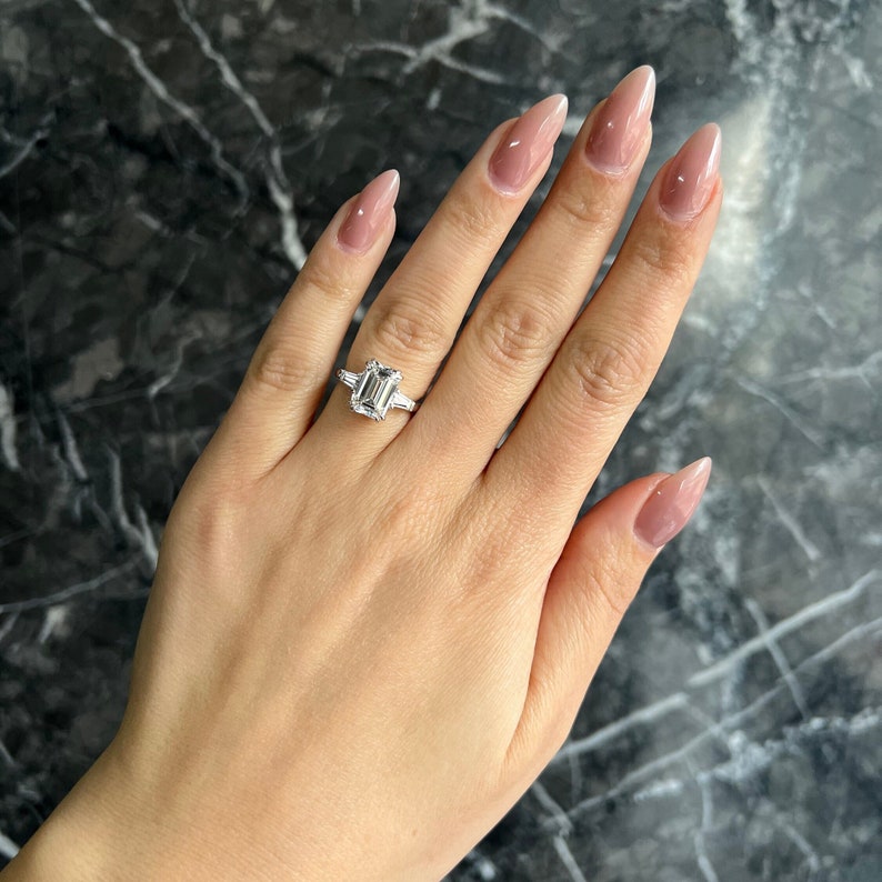 Emerald Cut 4.50 carat Rare D Color VVS2 Clarity IGI Certified Lab Grown Diamond Three Stone Engagement Ring, Side Baguettes 18k Gold image 1