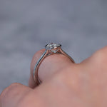 Load image into Gallery viewer, Through finger view of the ring showing the trellis work under the bezel.