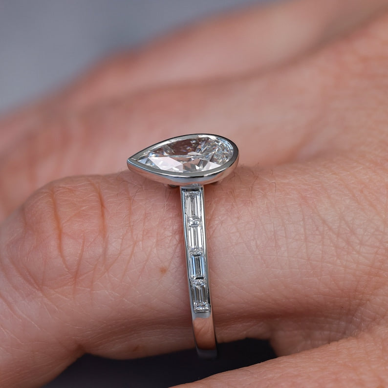 Side view of the ring showing the channel set baguettes