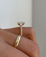 Load image into Gallery viewer, Top view of radiant cut 3.0tcw lab created diamond engagement ring with a cathedral setting and hidden halo that adds brilliance from every angle. This wedding ring is a beautiful expression of love, ideal for modern brides who want elegance, sparkle, and sustainability in one piece.