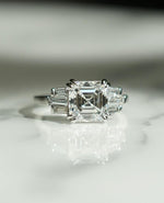 Load image into Gallery viewer, 4.50 total carat weight Asscher lab created diamond engagement ring featuring double prong details, IGI certified for quality. A stunning anniversary gift or forever classic ring, perfect for marking milestones with elegance.