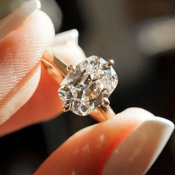 This 3ct cushion cut lab grown diamond solitaire ring features a cathedral setting with prong mount and a sleek straight shank. A timeless engagement ring, ideal as a unique bridal piece, birthday gift, or promise ring for her—crafted with ethical brilliance.