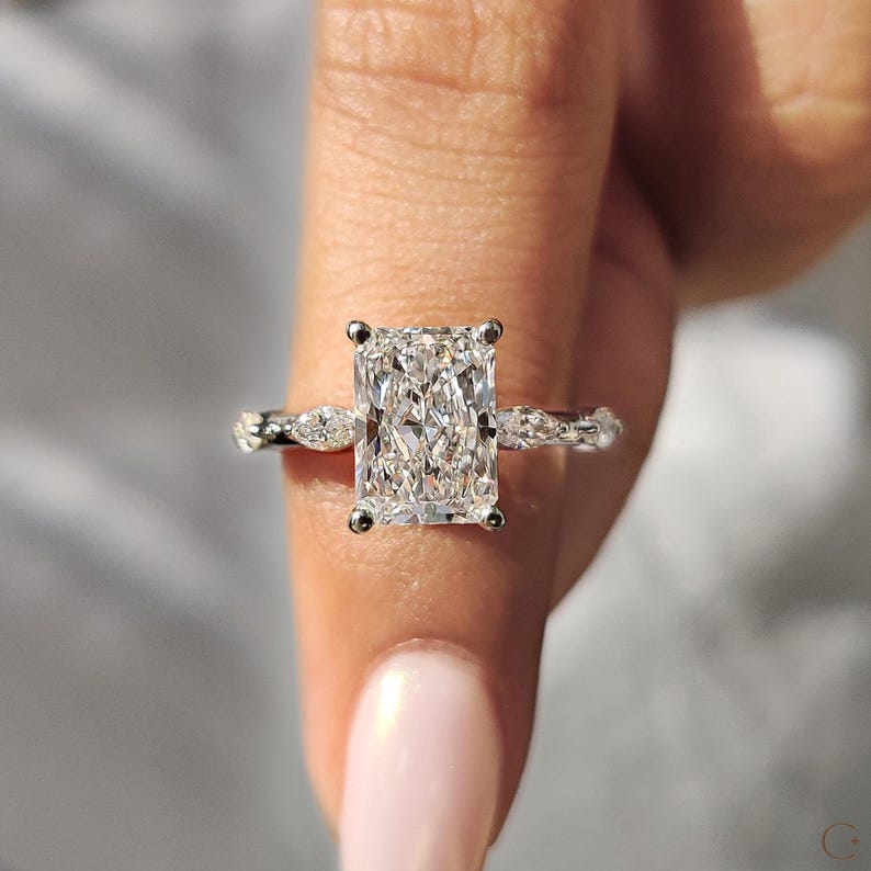 Radiant diamond ring crafted in a white gold band.
