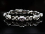 Load image into Gallery viewer, iced out evil eye bracelet