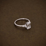Load image into Gallery viewer, 1.95 CTW Emerald Cut Lab Grown Diamond Engagement Ring | IGI Certified Ring with Marquise &amp; Round Side Diamonds image 4