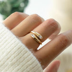Load image into Gallery viewer, gold spiral cubic zirconia ring on model