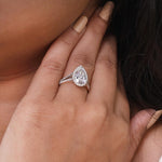 Load image into Gallery viewer, Lab grown pear shaped diamond halo engagement ring with split shank band in white gold