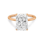 Load image into Gallery viewer, 14k rose gold ring featuring radiant cut lab grown diamond solitaire engagement ring set in 4 claw prongs.