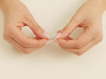 Load and play video in Gallery viewer, Five Stone Basket Moissanite Anniversary Band (0.50 Ct Tw)