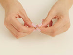 Load and play video in Gallery viewer, Alternating Round And Baguette Moissanite Wedding Band