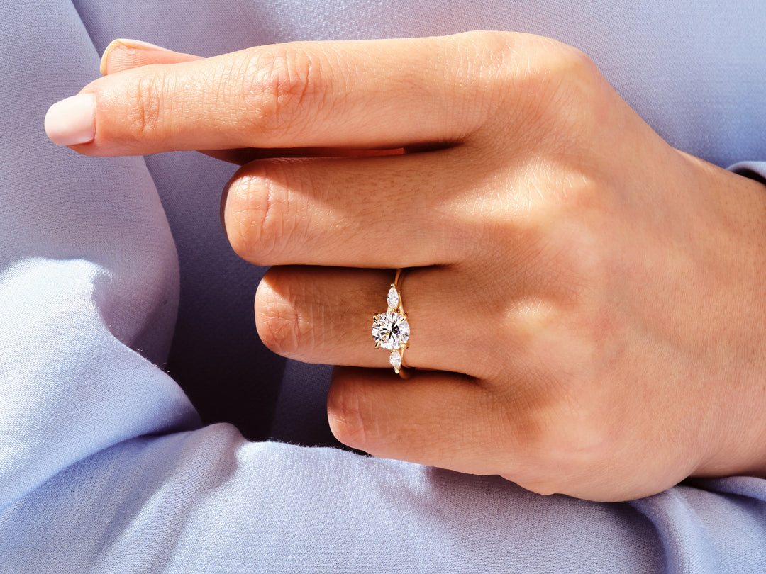 three stone diamond ring yellow gold